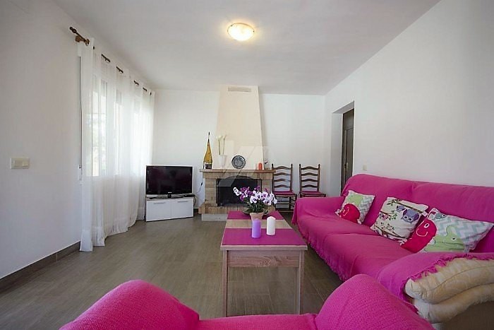 Living room with a fireplace.